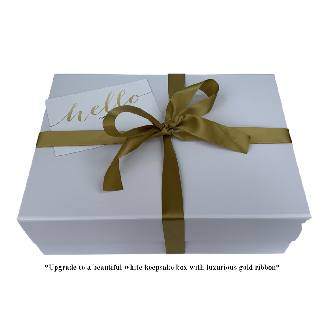 White keepsake gift box with gold ribbon