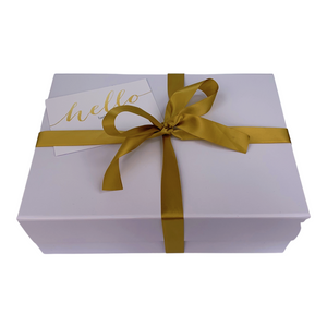 White keepsake gift box with gold ribbon