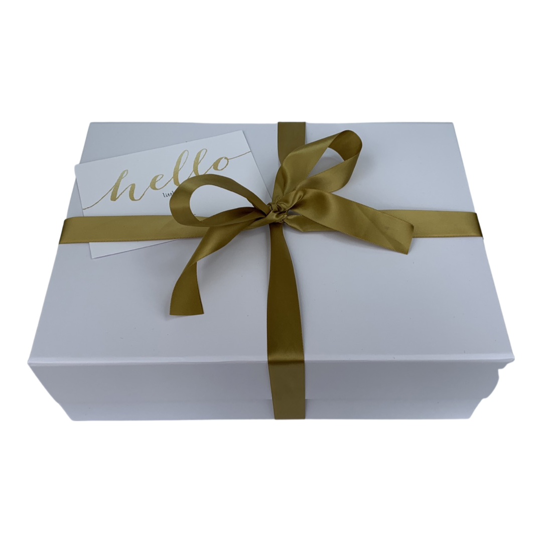 White keepsake box with gold ribbon