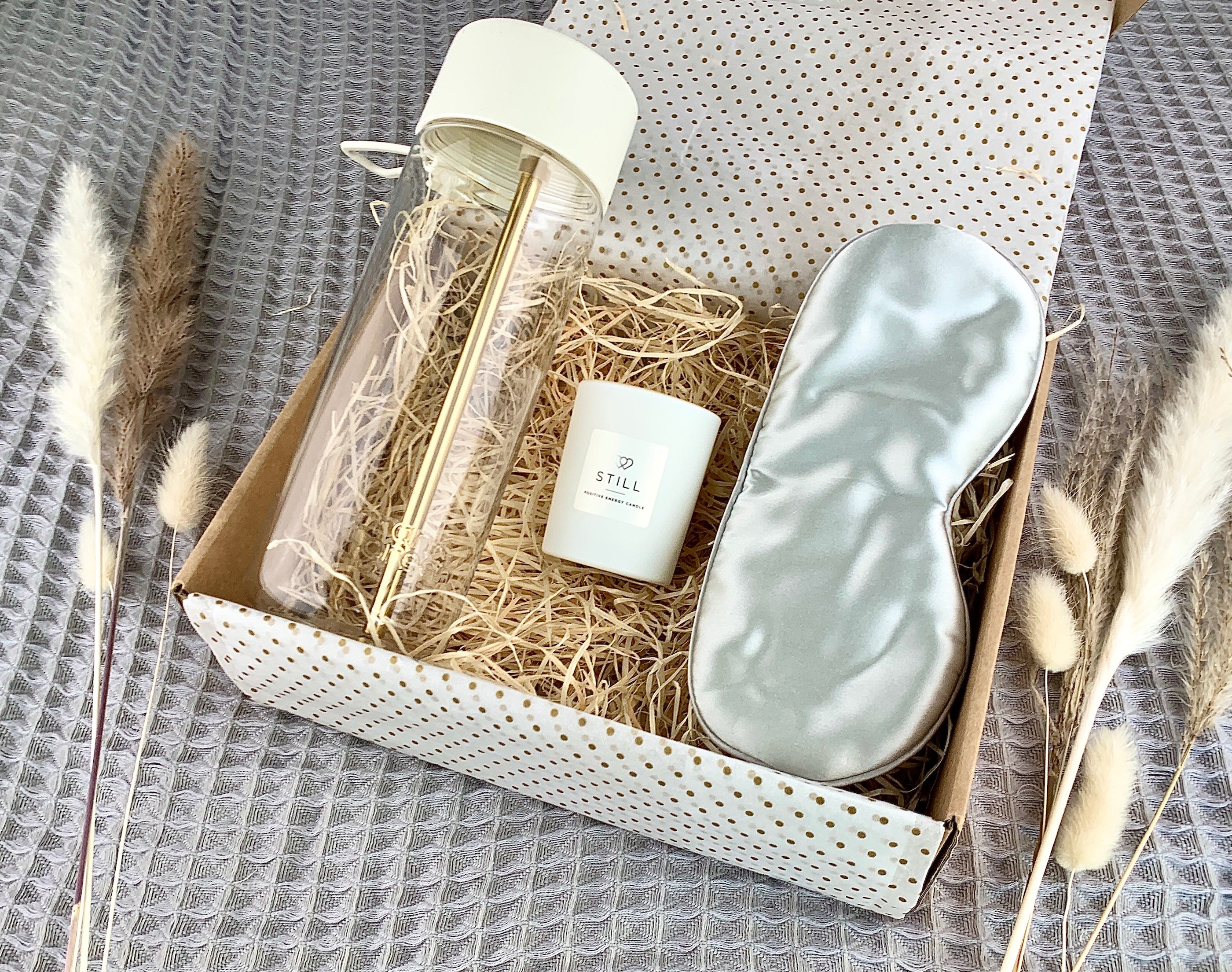 Self care gift set containing Frank Green water bottle, Still candle and 100% silk grey eye mask