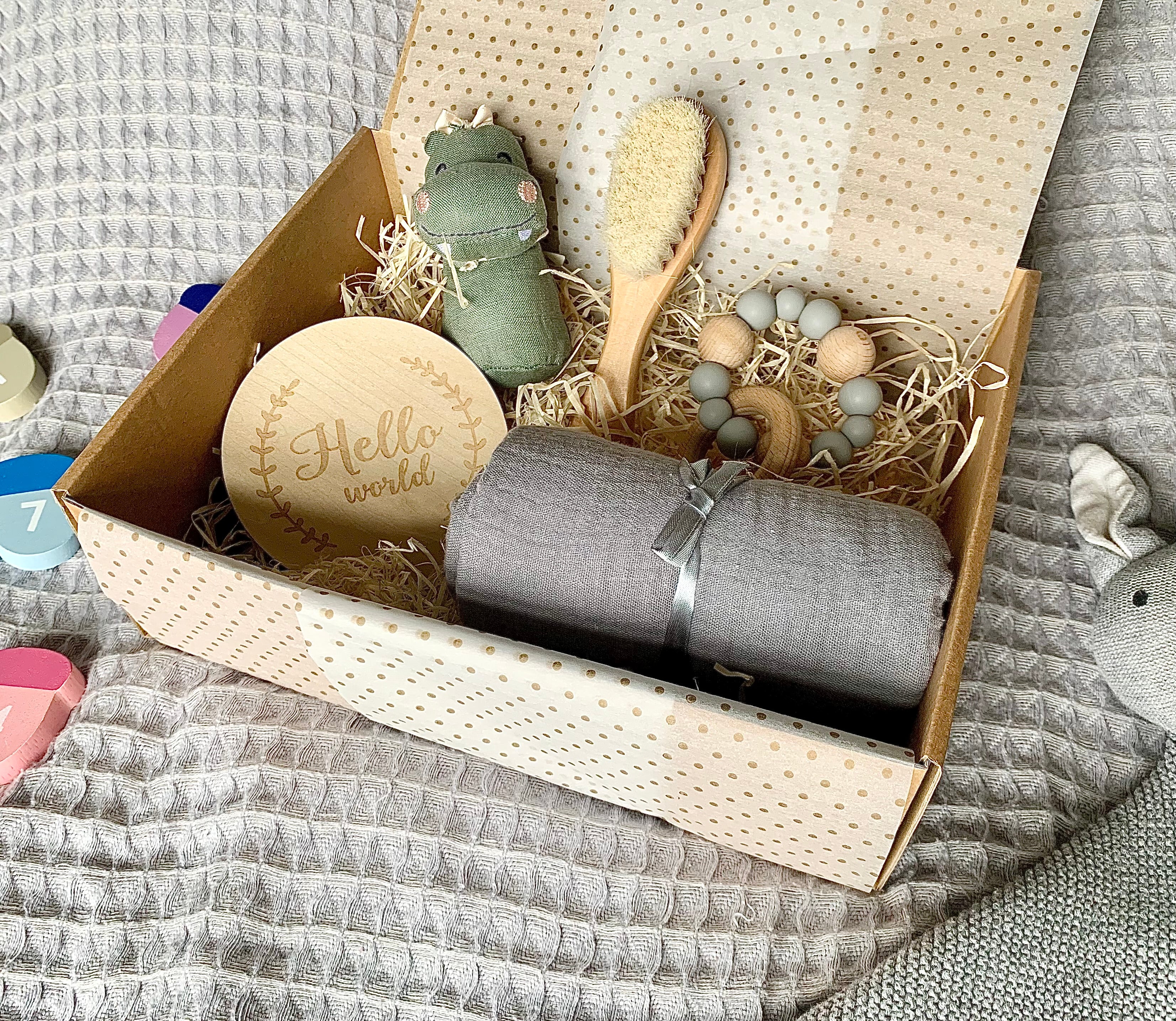 Classic newborn gift box with rattle, brush, teether, announcement disc and muslin