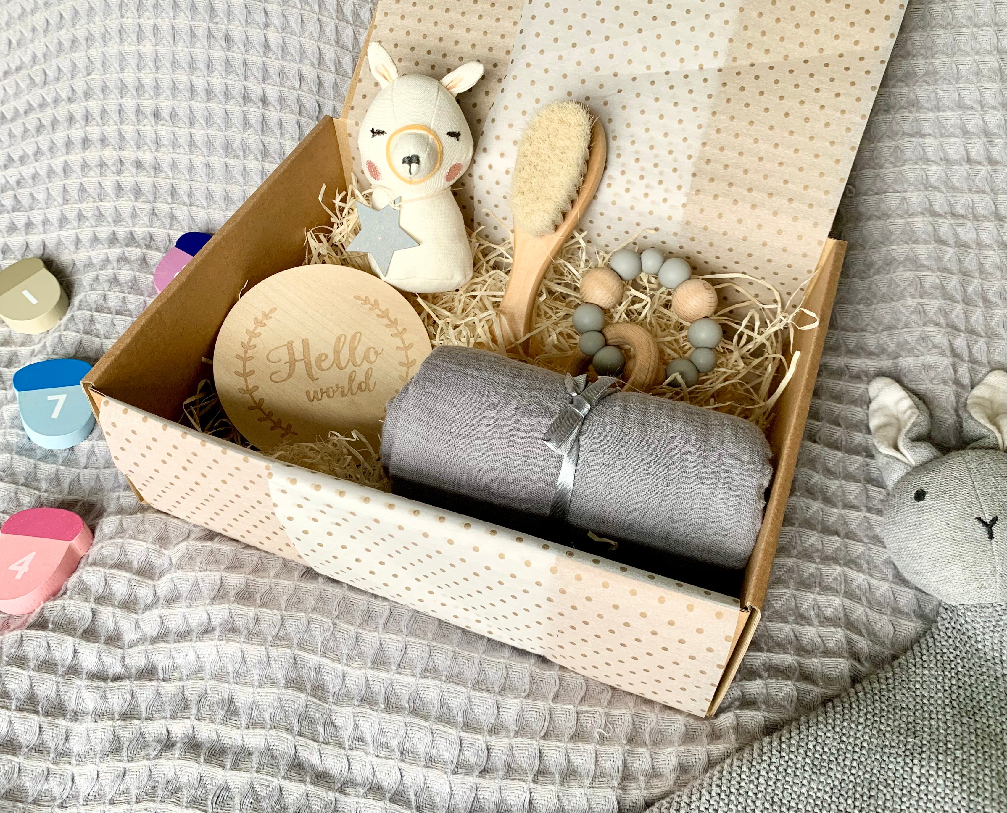 Classic newborn gift box with rattle, brush, teether, announcement disc and muslin