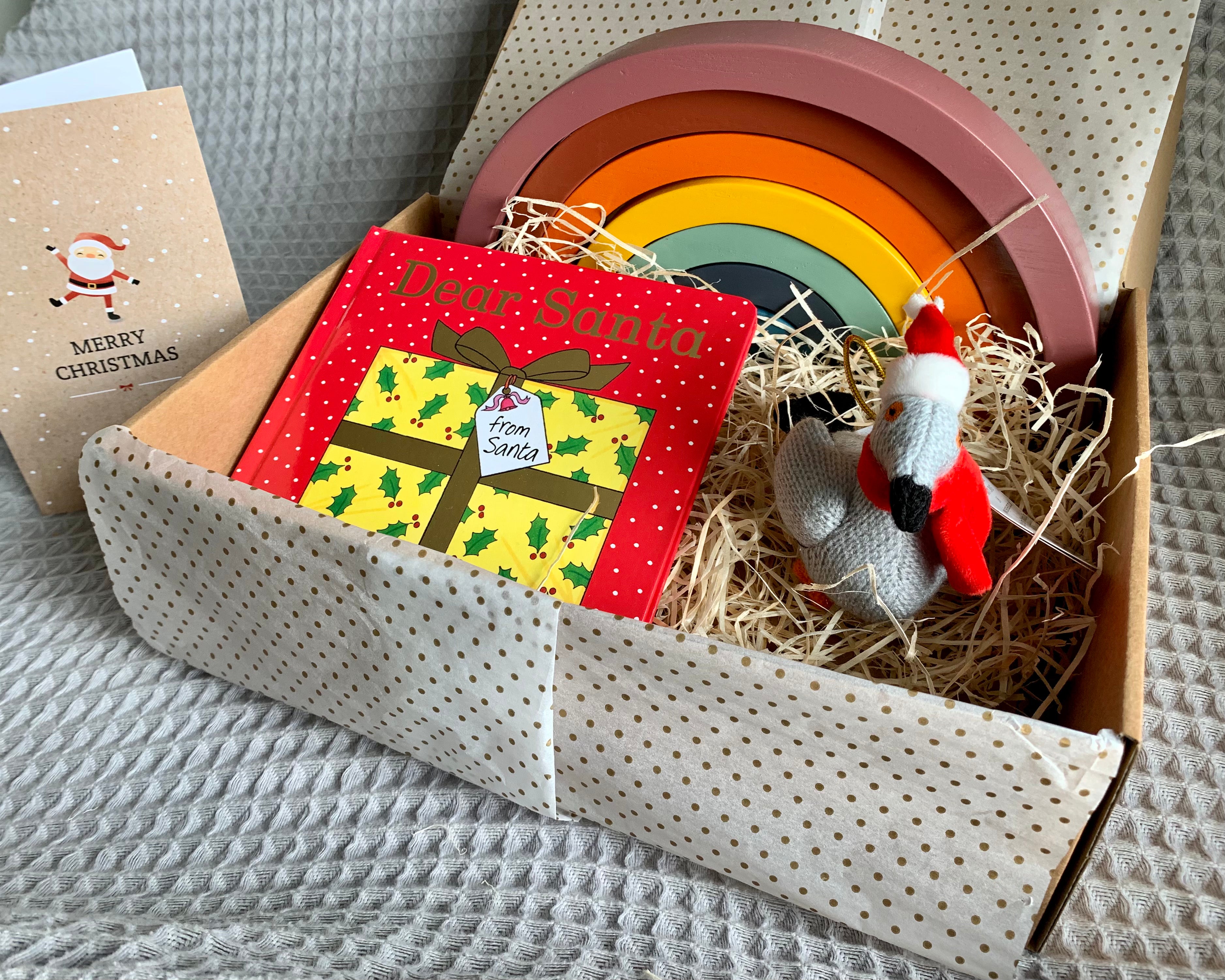 Christmas gift box with rainbow