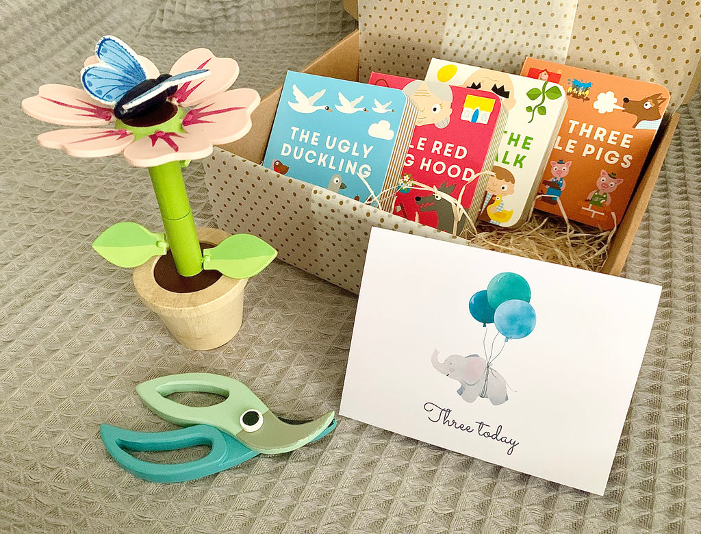 Third birthday gift box with wooden flower toy, fairytales book set and three today card